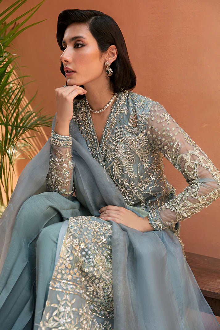 Model wearing Amora dress from Mushq's Tuscany Luxury Formals collection. Elegant Pakistani clothes online in UK at Signature Labels.