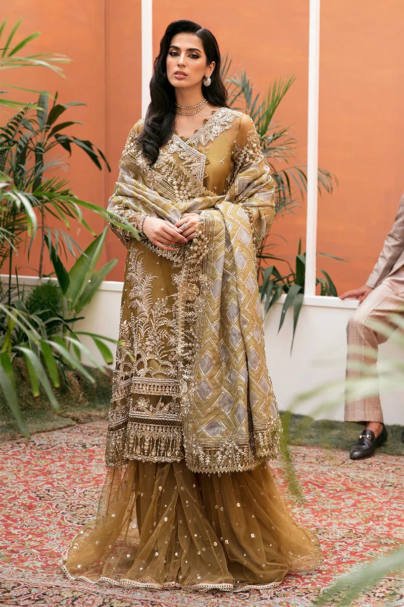 Model wearing Bosco dress from Mushq's Tuscany Luxury Formals. Pakistani clothes online in the UK at Signature Labels.