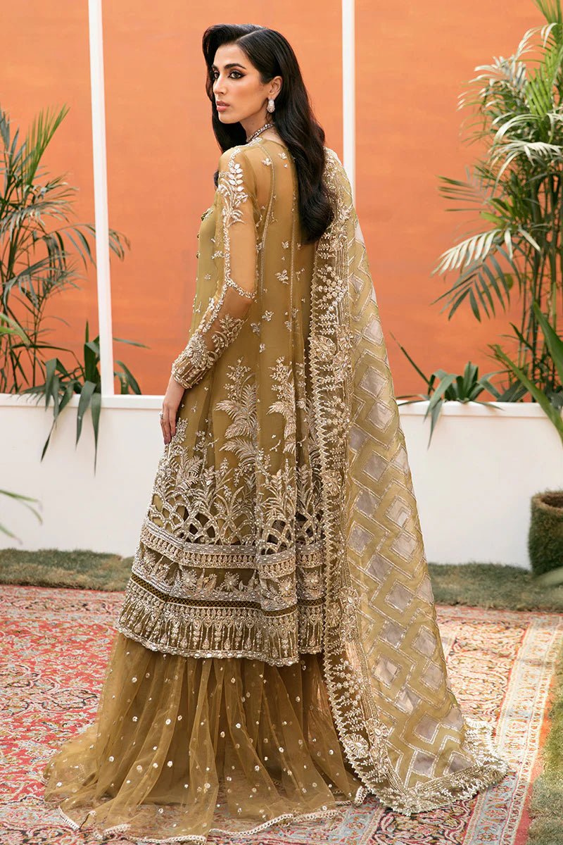 Model wearing Bosco dress from Mushq's Tuscany Luxury Formals. Pakistani clothes online in the UK at Signature Labels.