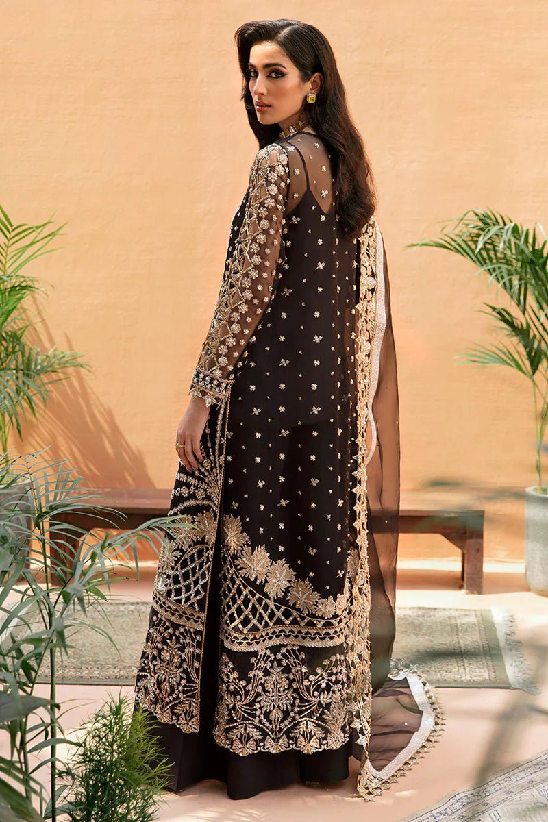 Model wearing Eleonora dress from Mushq's Tuscany Luxury Formals collection. Pakistani clothes online in UK at Signature Labels.