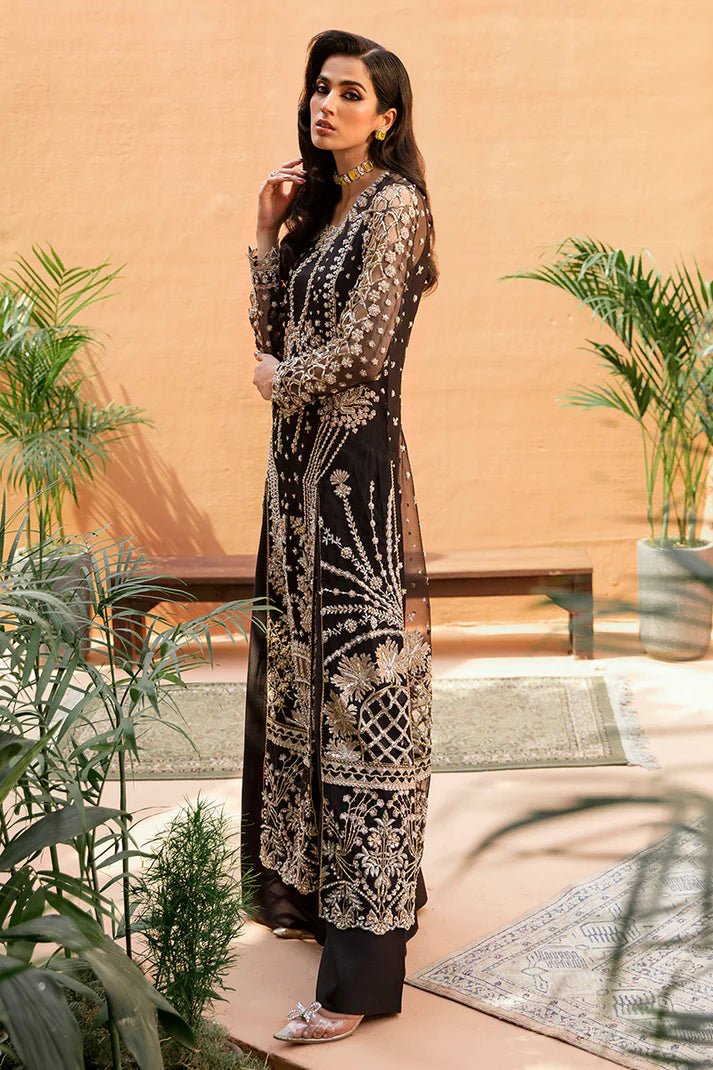 Model wearing Eleonora dress from Mushq's Tuscany Luxury Formals collection. Pakistani clothes online in UK at Signature Labels.