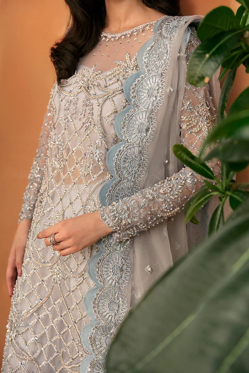 Model wearing Martina dress from Mushq's Tuscany Luxury Formals collection. Pakistani clothes online in UK at Signature Labels.