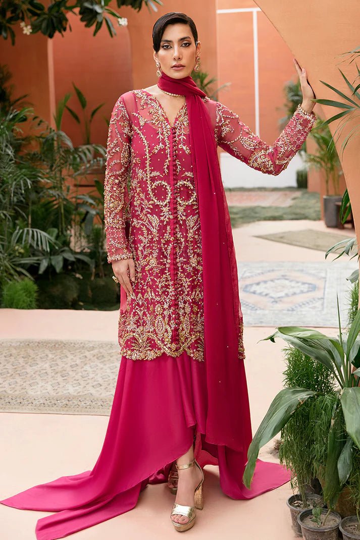 Model wearing Rosalia dress from Mushq's Tuscany Luxury Formals. Pakistani designer fashion online in UK at Signature Labels.