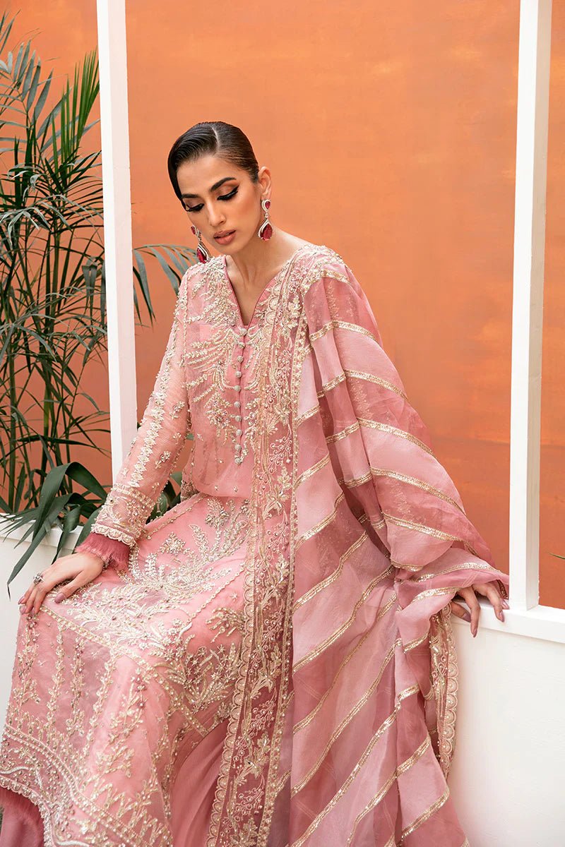 Model wearing Simona dress from Mushq's Tuscany Luxury Formals collection. Pakistani clothes online in UK at Signature Labels.