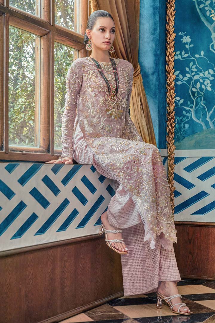 Model wearing Deena dress from Mysie by Tahira's Alara collection. Perfect for those seeking Pakistani clothes online in UK.