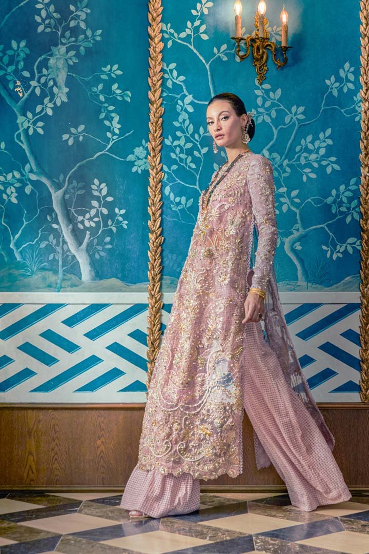 Model wearing Deena dress from Mysie by Tahira's Alara collection. Perfect for those seeking Pakistani clothes online in UK.