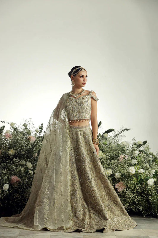 Model wearing Hansel from Mysie by Tahira's Arzu Bridals '24 collection in sophisticated beige. Wedding wear, bridal, Pakistani clothes online in UK.