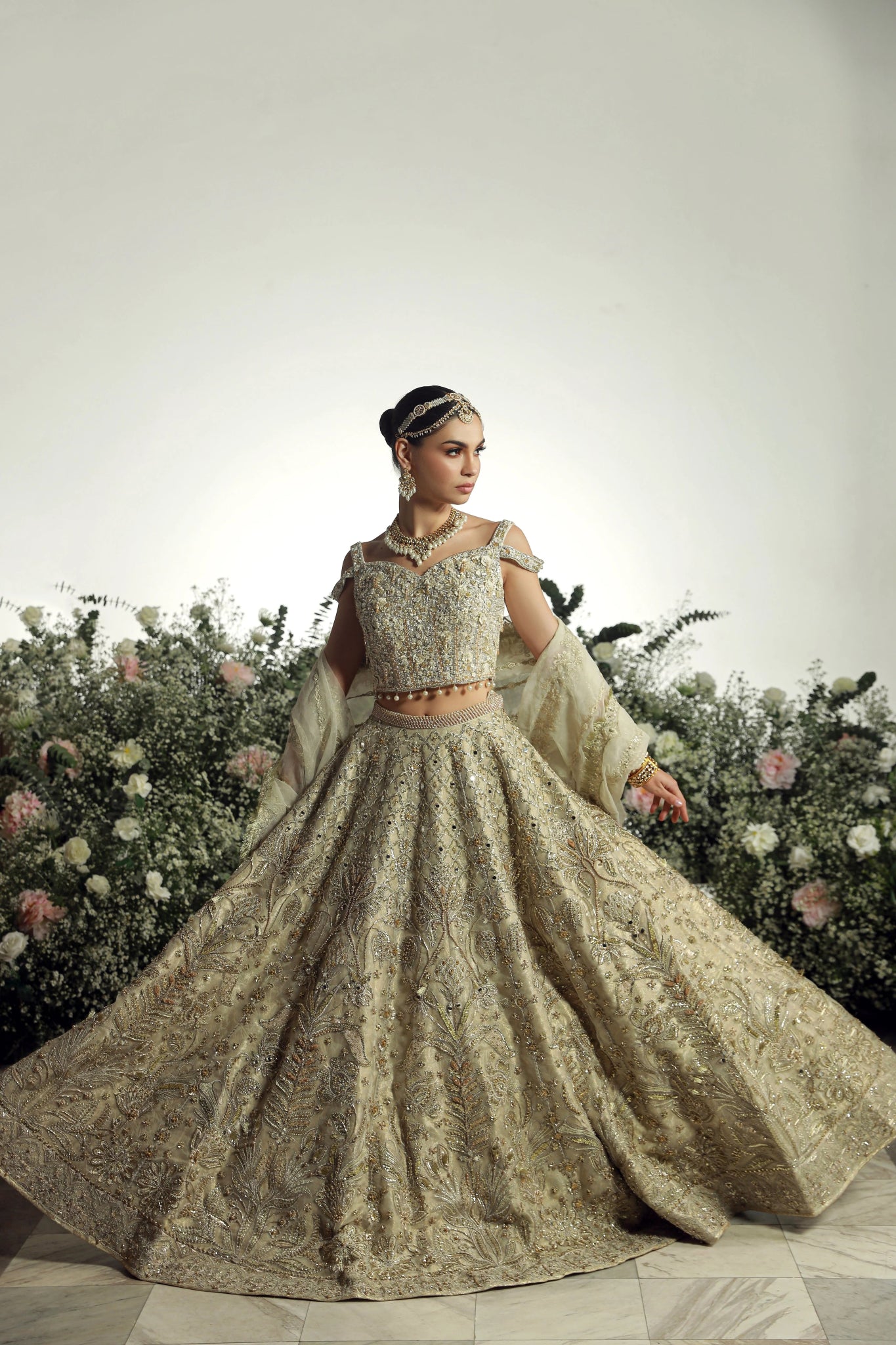 Model wearing Hansel from Mysie by Tahira's Arzu Bridals '24 collection in sophisticated beige. Wedding wear, bridal, Pakistani clothes online in UK.