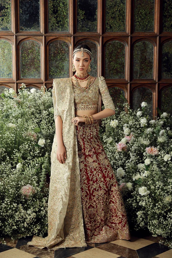 Model wearing Irtiqa from Mysie by Tahira's Arzu Bridals '24 collection in elegant ivory. Wedding wear, bridal, Pakistani clothes online in UK.