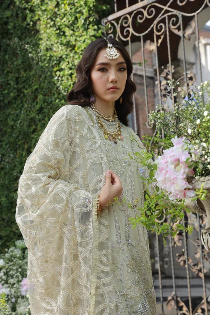 Model wearing Pherah from Mysie by Tahira's Arzu Bridals '24 collection in elegant gold. Wedding wear, bridal, Pakistani clothes online in UK.