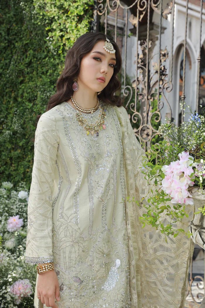 Model wearing Pherah from Mysie by Tahira's Arzu Bridals '24 collection in elegant gold. Wedding wear, bridal, Pakistani clothes online in UK.