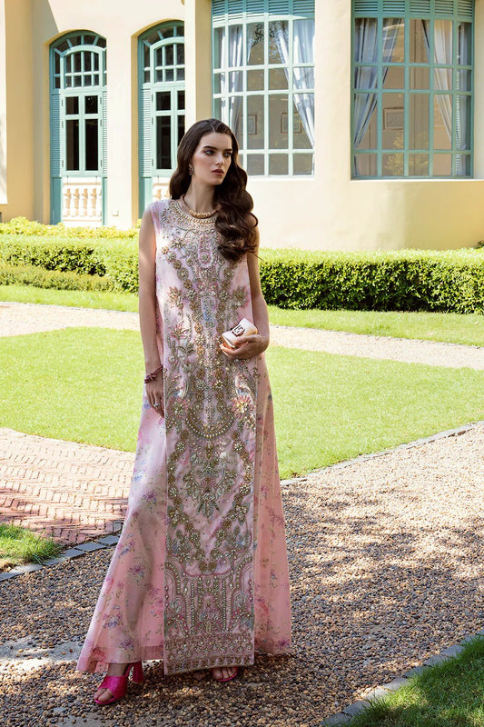 Model wearing Fatine dress from Mysie by Tahira Eid Pret '24, a symbol of Pakistani luxury fashion in the UK.