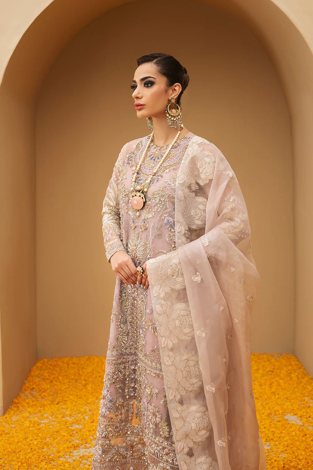 Model wearing Festive Formal's Sarafeen, an equisite mold by Mysie by Tahira UK, Pakistani Clothes UK.