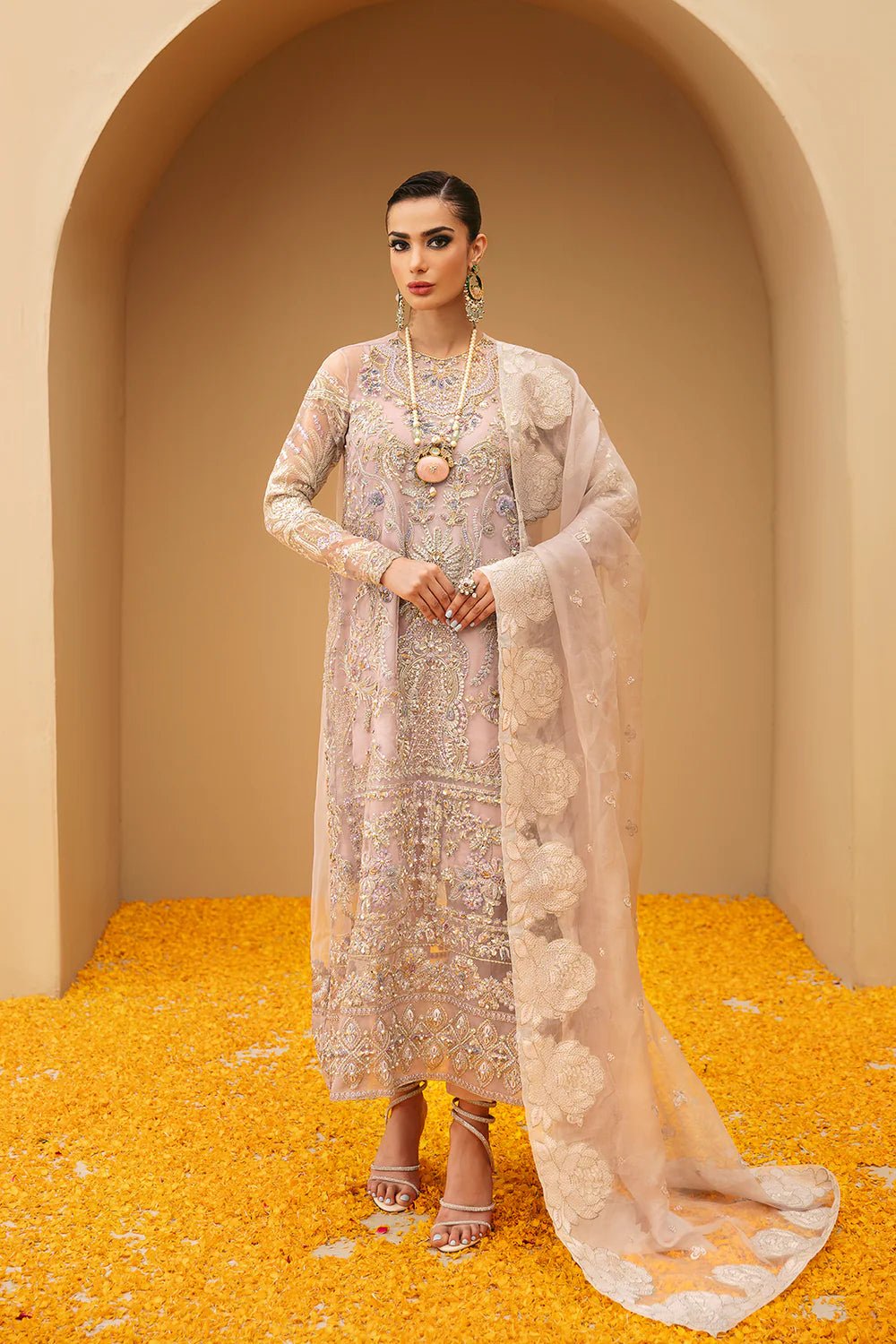 Model wearing Festive Formal's Sarafeen, an equisite mold by Mysie by Tahira UK, Pakistani Clothes UK.