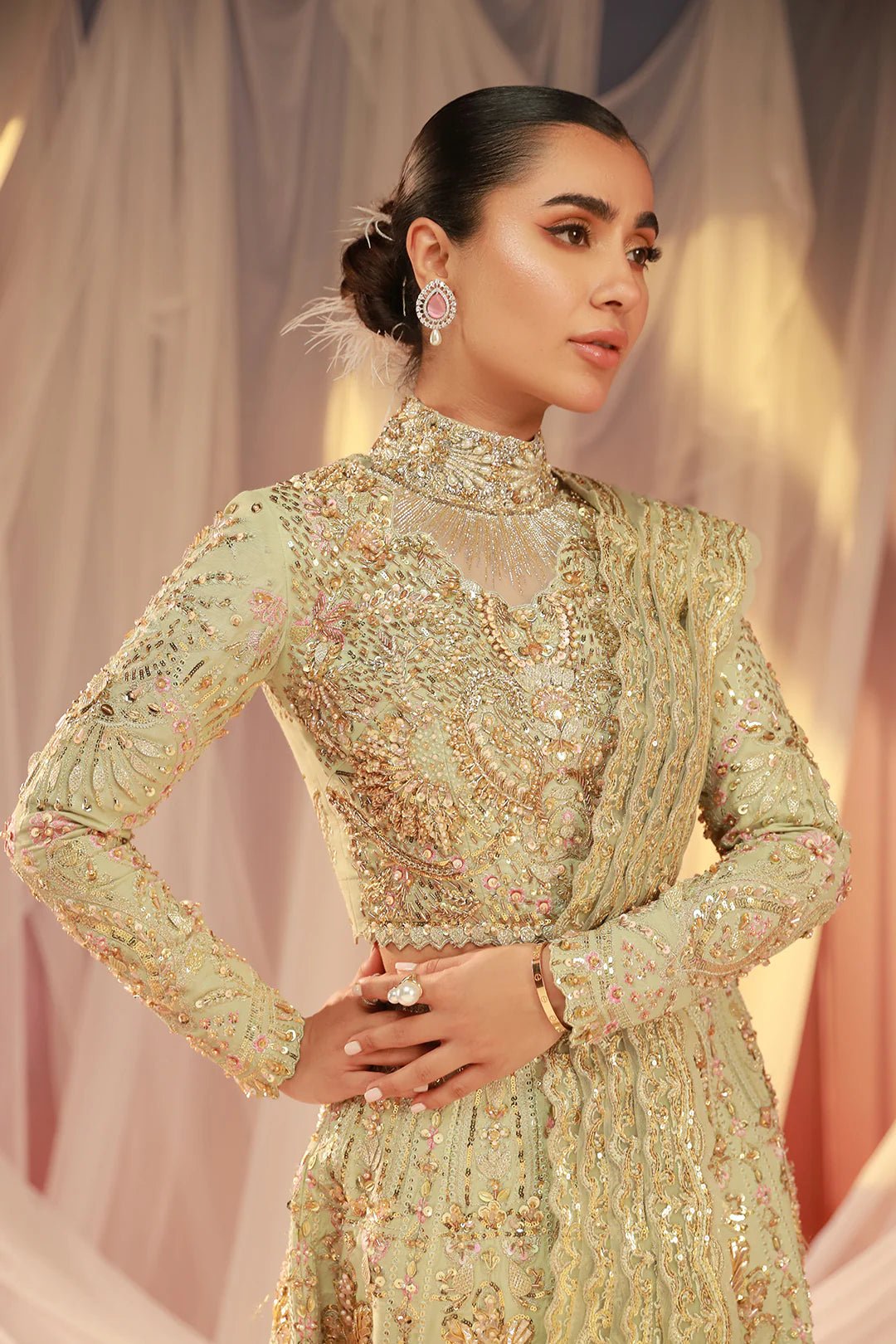 Model wearing Mahi dress from Mysie by Tahira, Poetique Bridal 24 collection. Pakistani clothes online in UK.