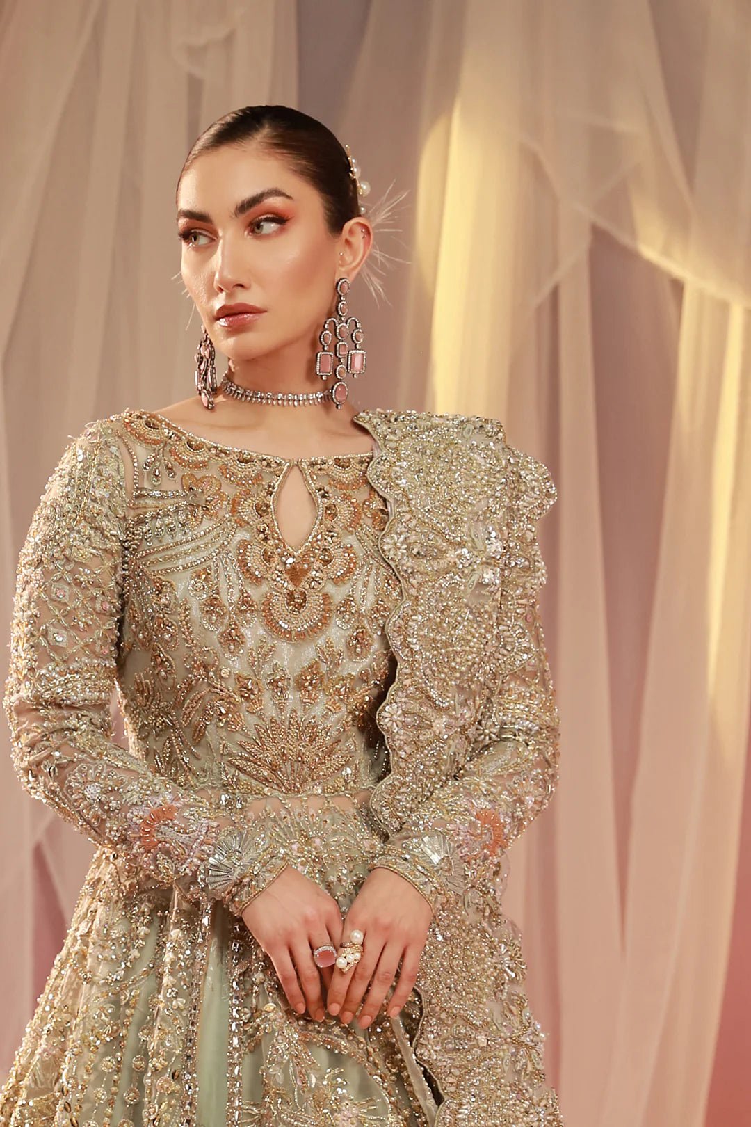 Model wearing Parisa dress from Mysie by Tahira, Poetique Bridal 24 collection. Pakistani clothes online in UK.