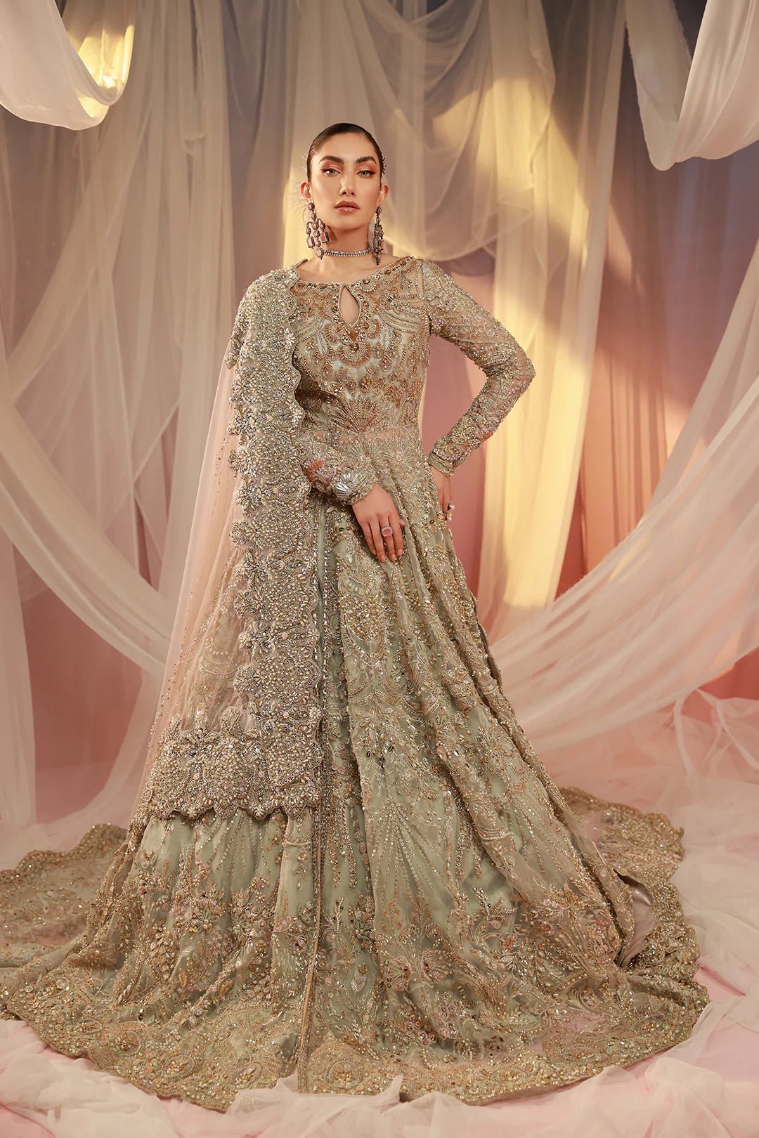 Model wearing Parisa dress from Mysie by Tahira, Poetique Bridal 24 collection. Pakistani clothes online in UK.