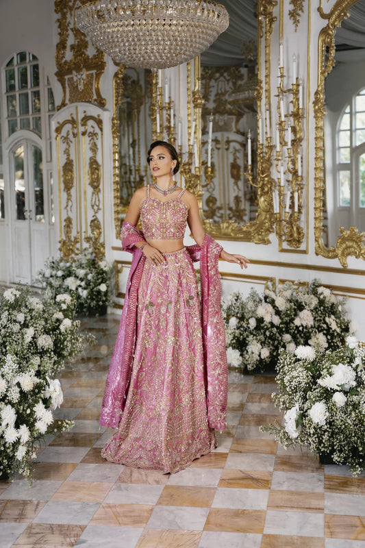 Model wearing pink CELINE dress from Mysie by Tahira's POÉTIQUE'24 SUMMER collection. Perfect for weddings. Pakistani clothes online in UK.