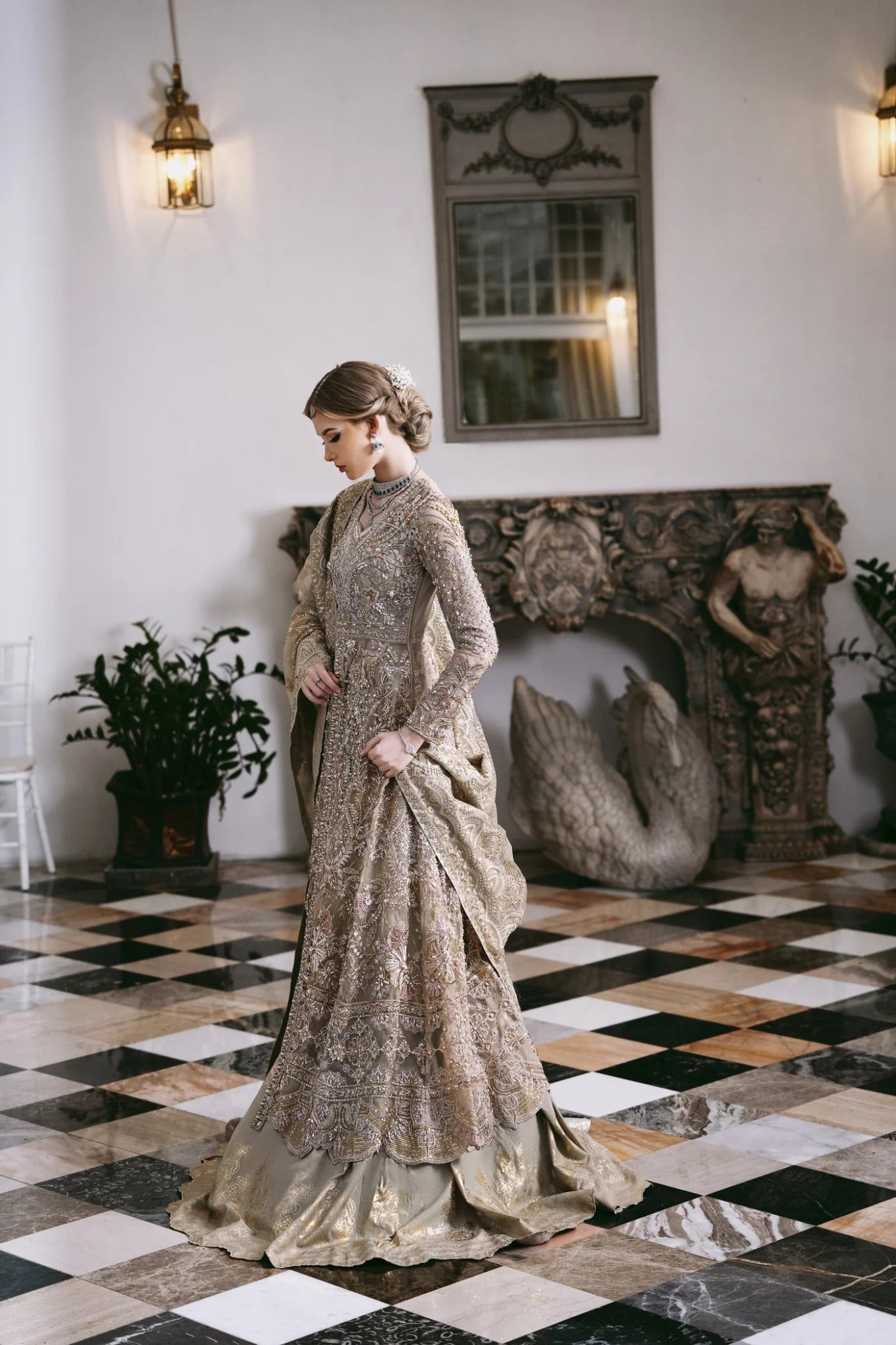 Model wearing a gold embroidered dress from Mysie by Tahira's POÉTIQUE'24 SUMMER collection, perfect for weddings. Pakistani clothes online in UK.