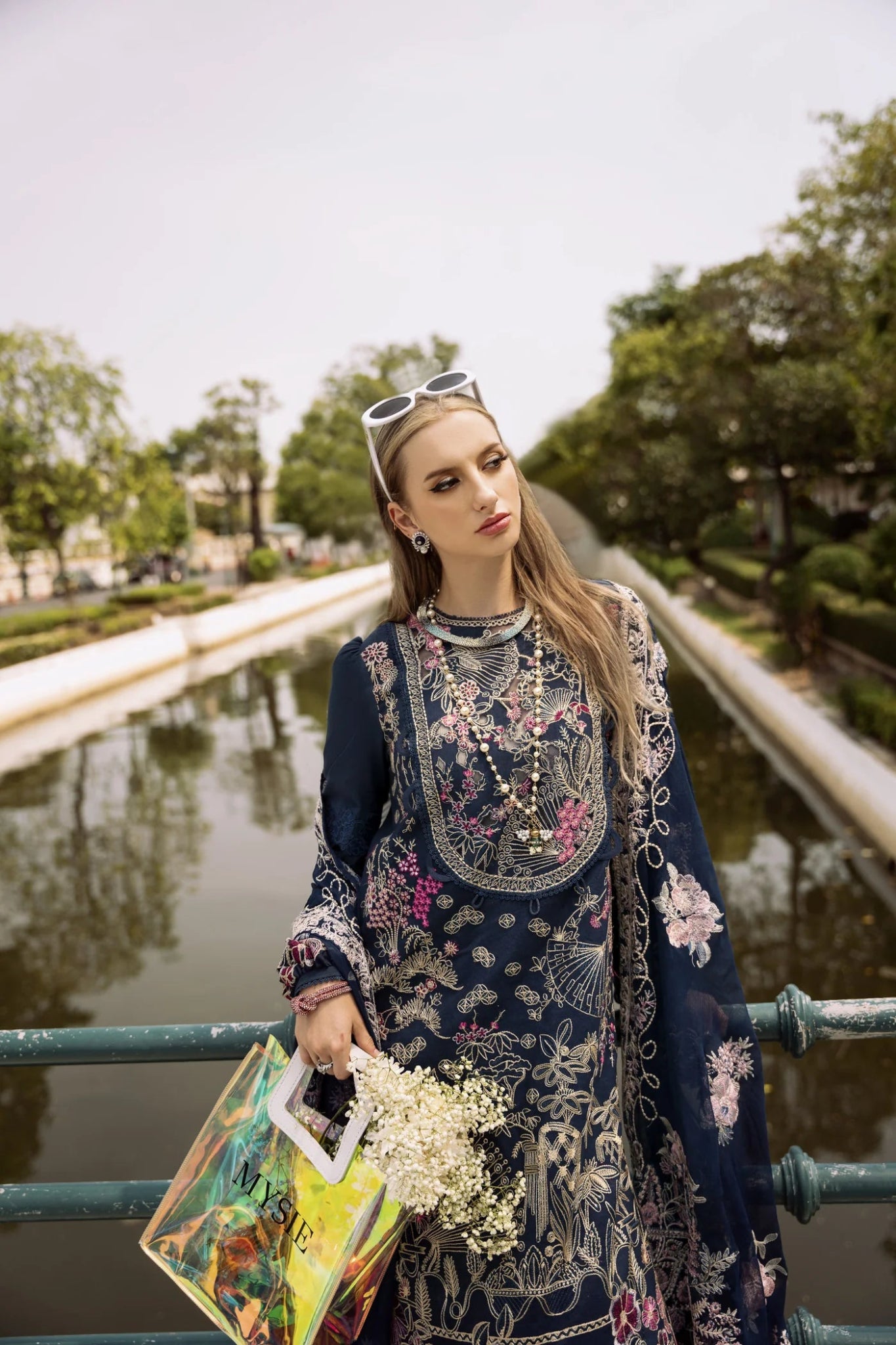 Model wearing LANA dress from Mysie by Tahira, Zenal Summer Pret collection. Pakistani clothes online in UK.