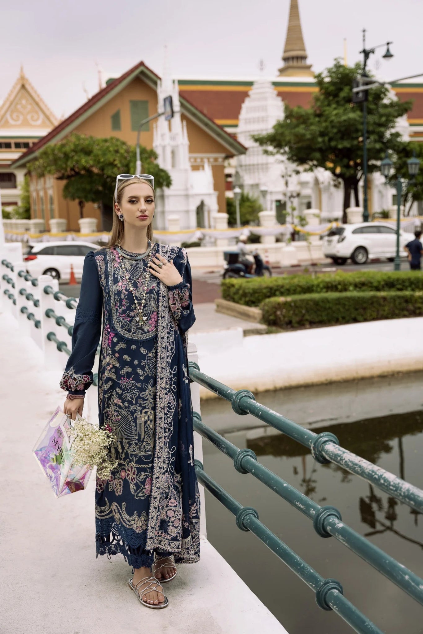 Model wearing LANA dress from Mysie by Tahira, Zenal Summer Pret collection. Pakistani clothes online in UK, contemporary style and exquisite craftsmanship.