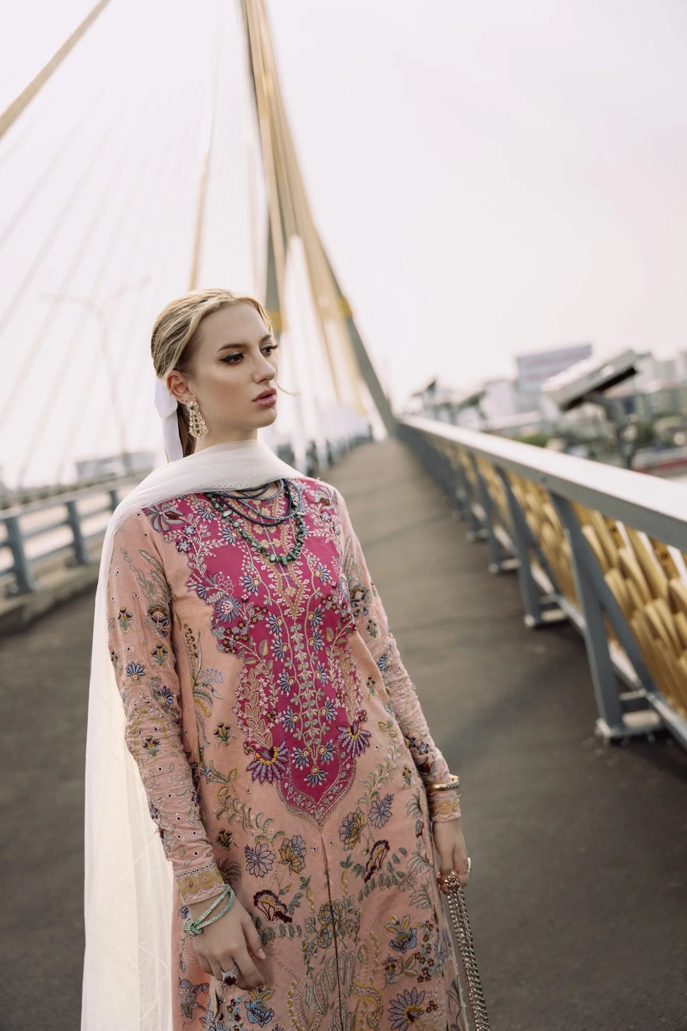 Model wearing peach and pink LIARA dress from Mysie By Tahira, Zenal Summer Pret collection. Pakistani designer clothes in UK, readymade clothes.