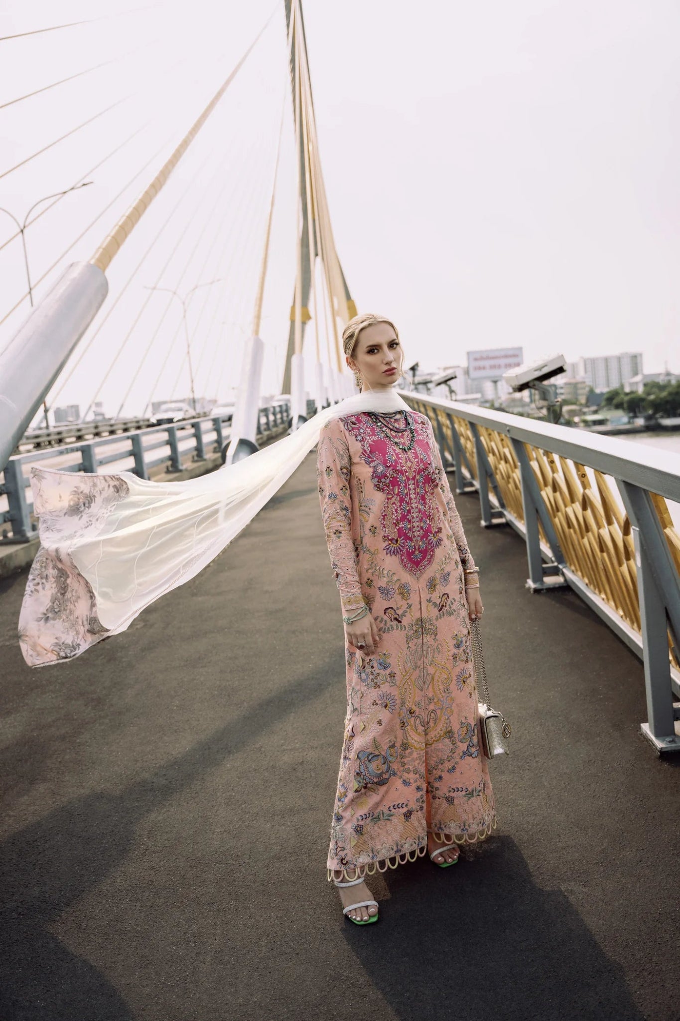 Model wearing peach and pink LIARA dress from Mysie By Tahira, Zenal Summer Pret collection. Pakistani designer clothes in UK, readymade clothes.