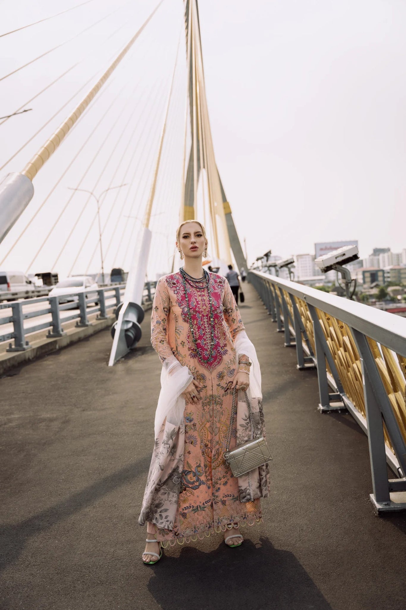 Model wearing peach and pink LIARA dress from Mysie By Tahira, Zenal Summer Pret collection. Pakistani designer clothes in UK, readymade clothes.