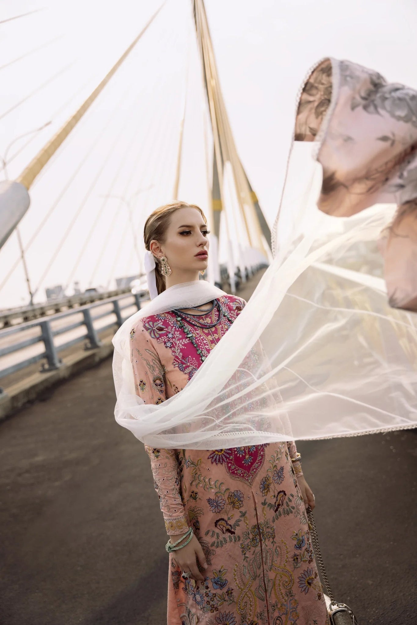 Model wearing peach and pink LIARA dress from Mysie By Tahira, Zenal Summer Pret collection. Pakistani designer clothes in UK, readymade clothes.