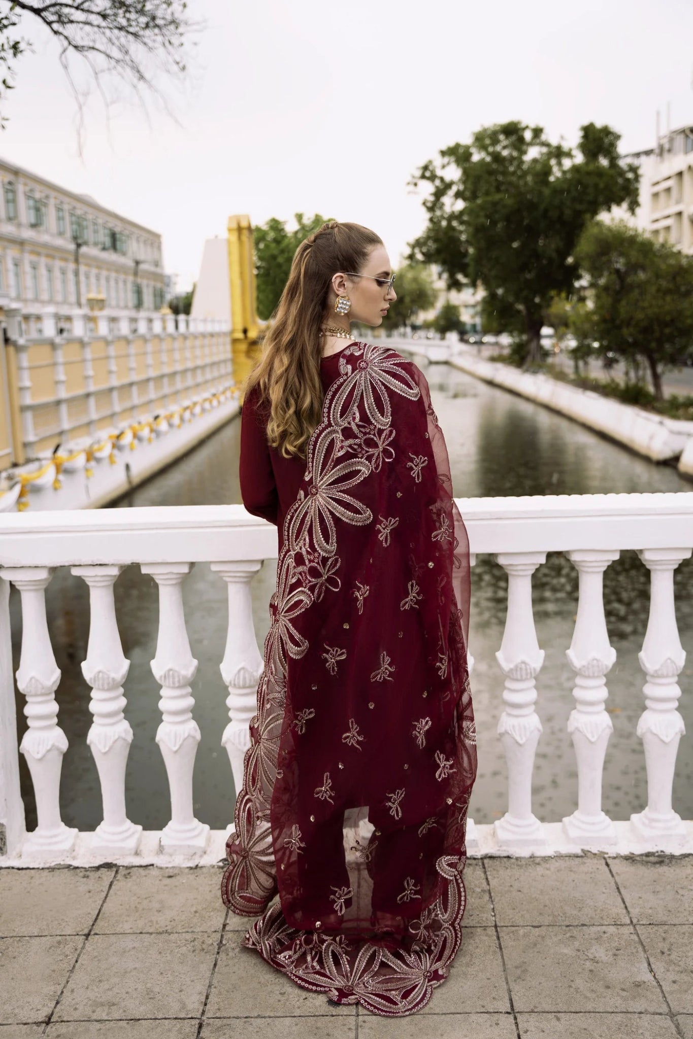 Model wearing maroon NIHAN dress from Mysie By Tahira's Zenal Summer Pret collection, Pakistani designer clothes in UK, readymade clothes.