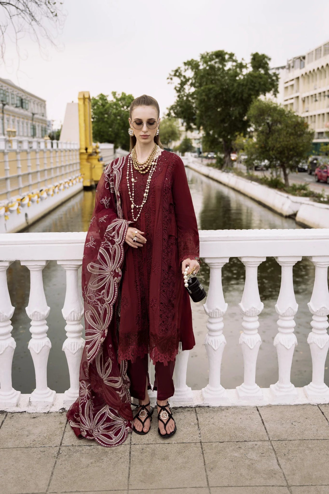 Model wearing maroon NIHAN dress from Mysie By Tahira's Zenal Summer Pret collection, Pakistani designer clothes in UK, readymade clothes.