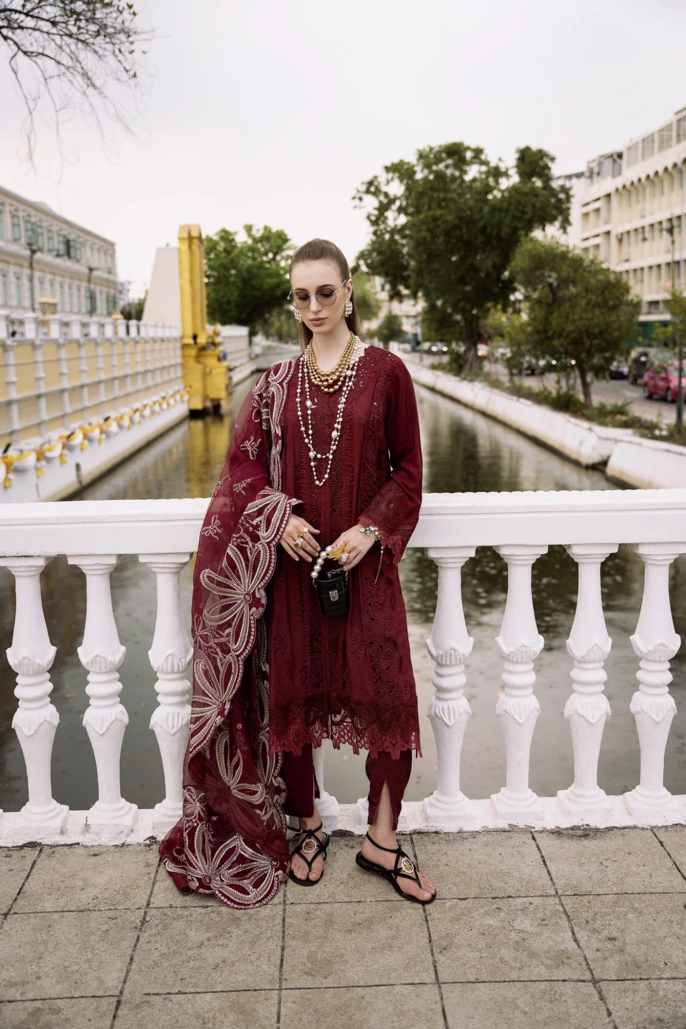 Model wearing maroon NIHAN dress from Mysie By Tahira's Zenal Summer Pret collection, Pakistani designer clothes in UK, readymade clothes.