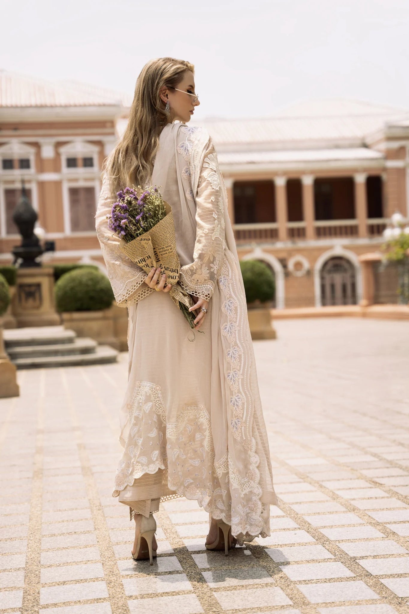 Model wearing cream Pinkie dress from Mysie By Tahira's Zenal Summer Pret collection, Pakistani designer clothes in UK, readymade clothes.