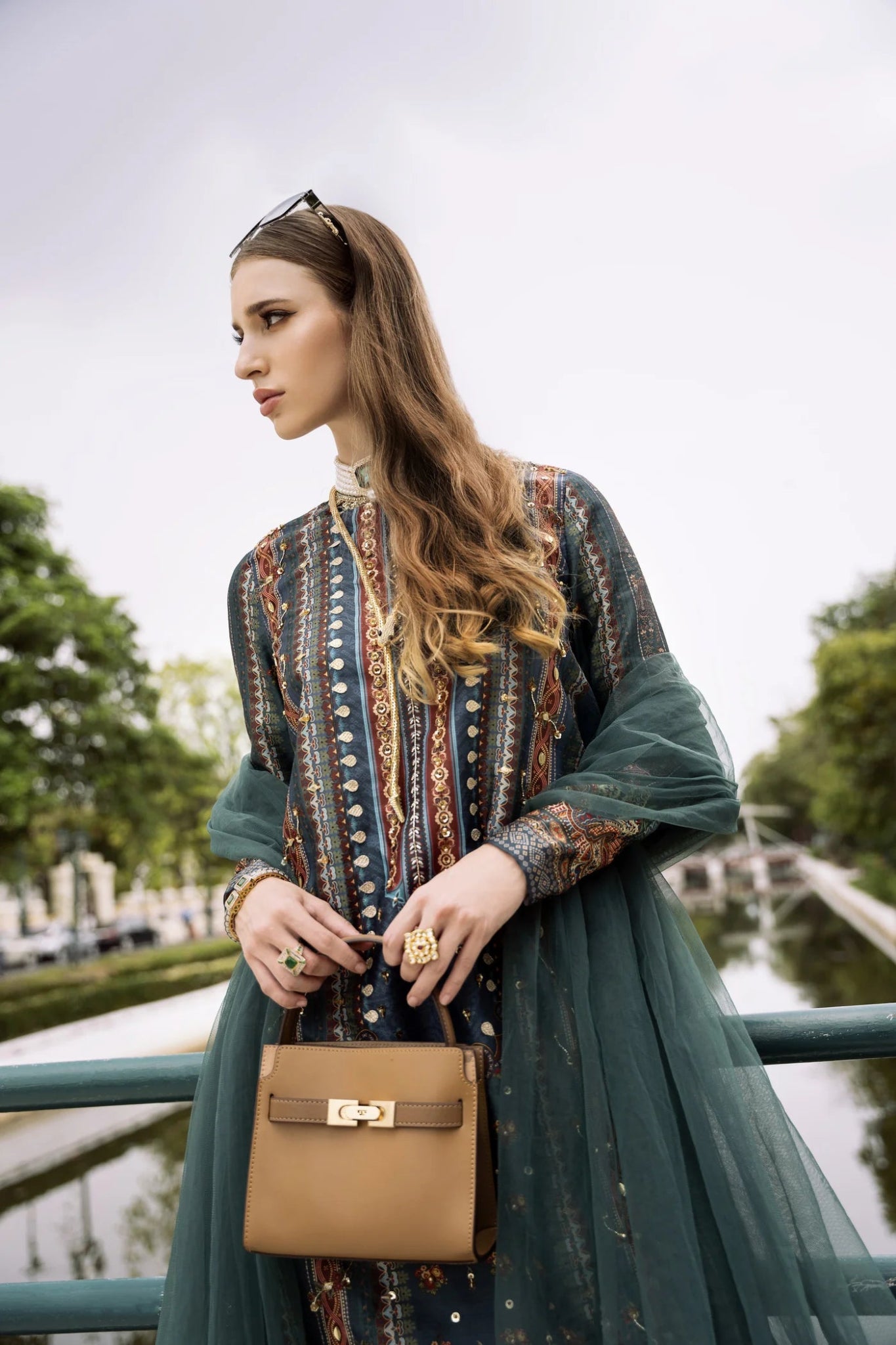 Model wearing green RISHA dress from Mysie By Tahira, part of the Zenal Summer Pret collection. Perfect for showcasing Pakistani designer clothes in the UK, including readymade clothing options.