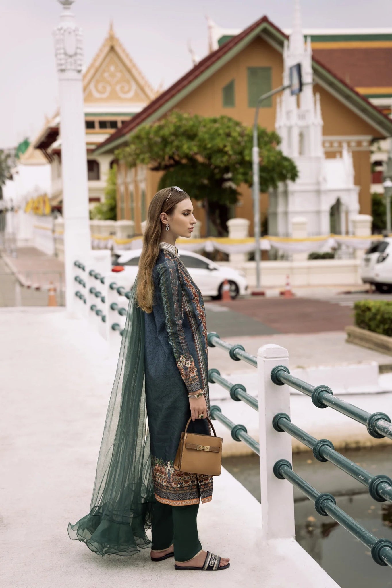 Model wearing green RISHA dress from Mysie By Tahira, part of the Zenal Summer Pret collection. Perfect for showcasing Pakistani designer clothes in the UK, including readymade clothing options.