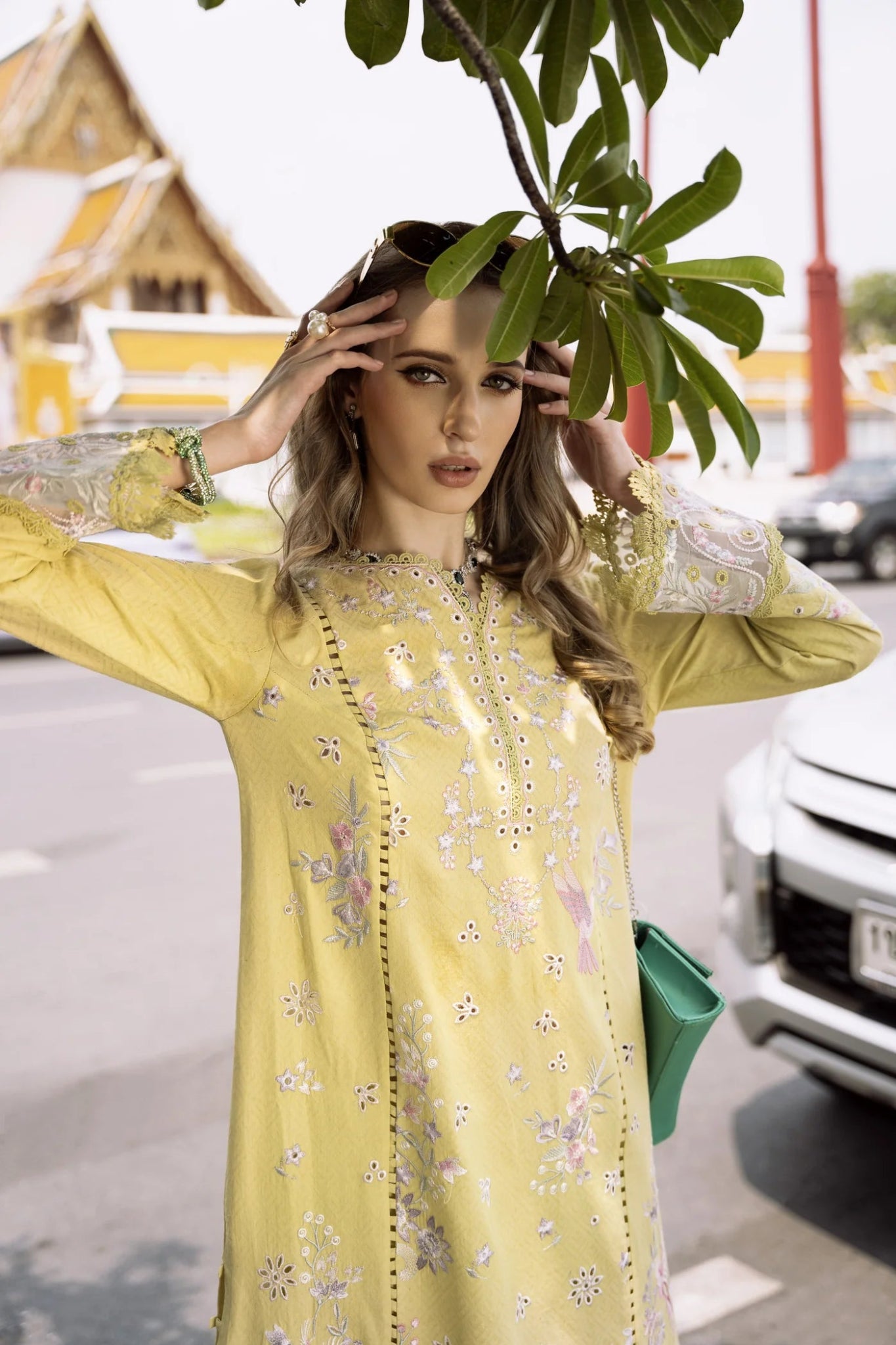 Model wearing yellow Sila dress from Mysie By Tahira's Zenal Summer Pret collection, Pakistani designer clothes in UK, readymade clothes.