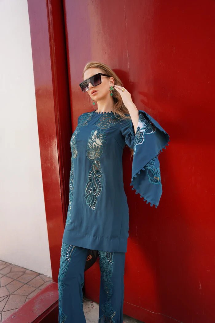 Model wearing teal Suzanne dress from Mysie By Tahira's Zenal Summer Pret collection, Pakistani designer clothes in UK, readymade clothes.