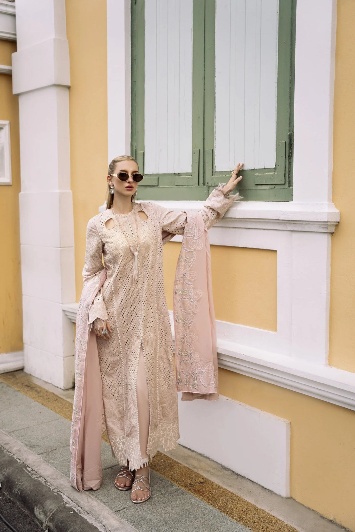 Model wearing cream Yurfa dress from Mysie By Tahira's Zenal Summer Pret collection, Pakistani designer clothes in UK, readymade clothes.