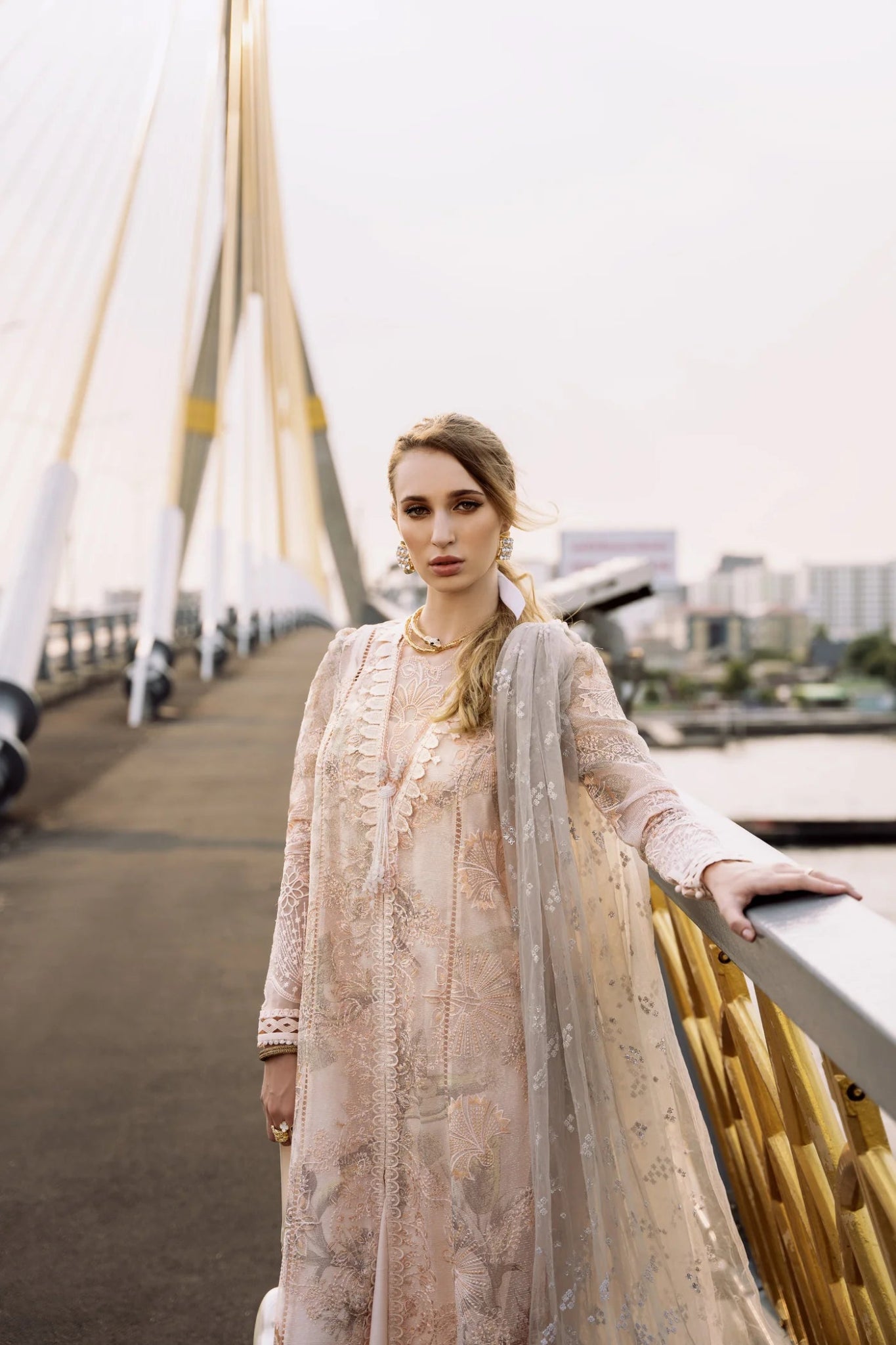 Model wearing a peach ZENEL dress from Mysie By Tahira, Zenal Summer Pret collection. Pakistani designer clothes in UK, readymade clothes.