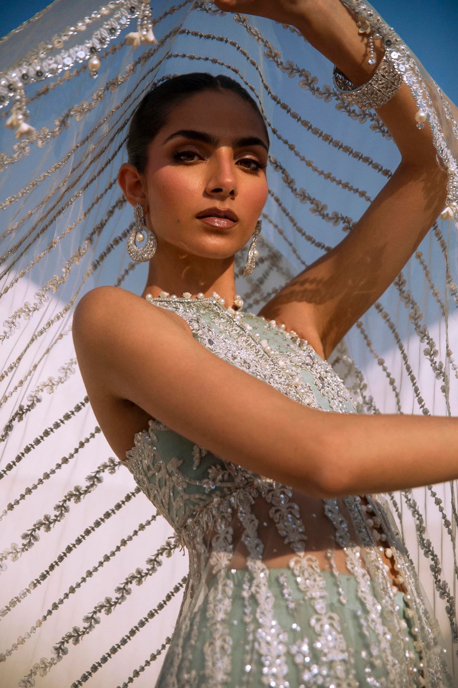 Models in Sana Safinaz N241 - 004 - 3CT luxe embellished gowns, from NURA Collection.