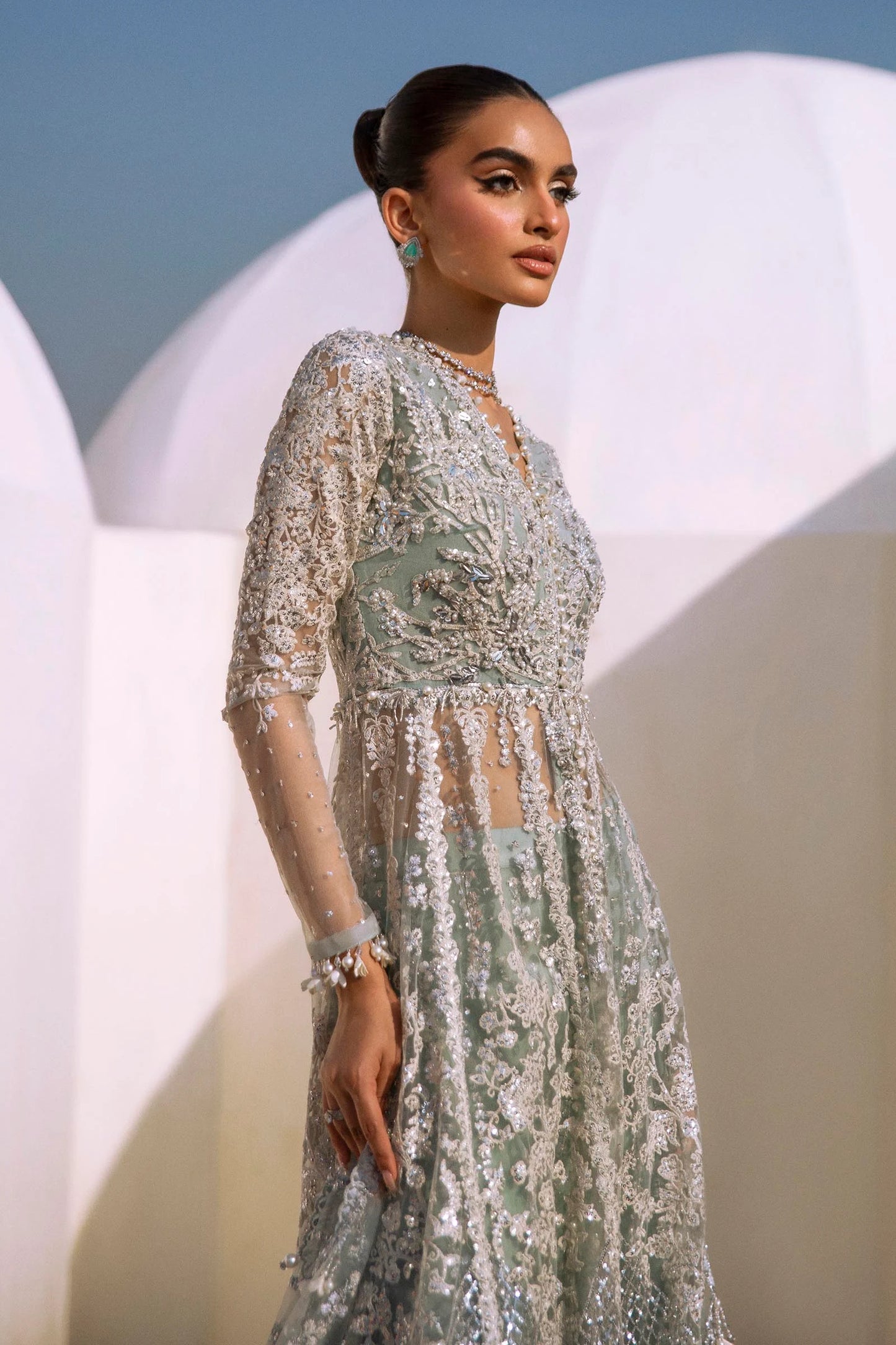 Models in Sana Safinaz N241 - 004 - 3CT luxe embellished gowns, from NURA Collection.