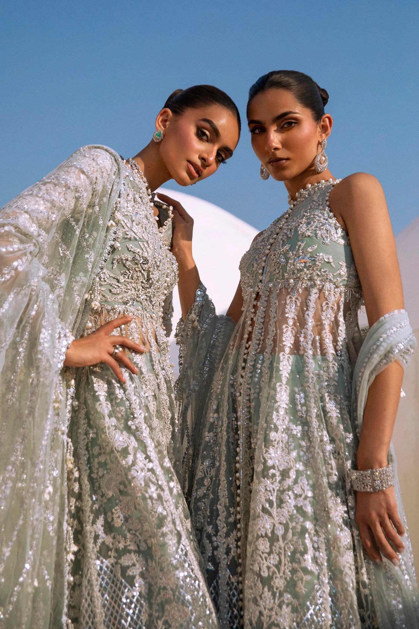 Models in Sana Safinaz N241 - 004 - 3CT luxe embellished gowns, from NURA Collection.