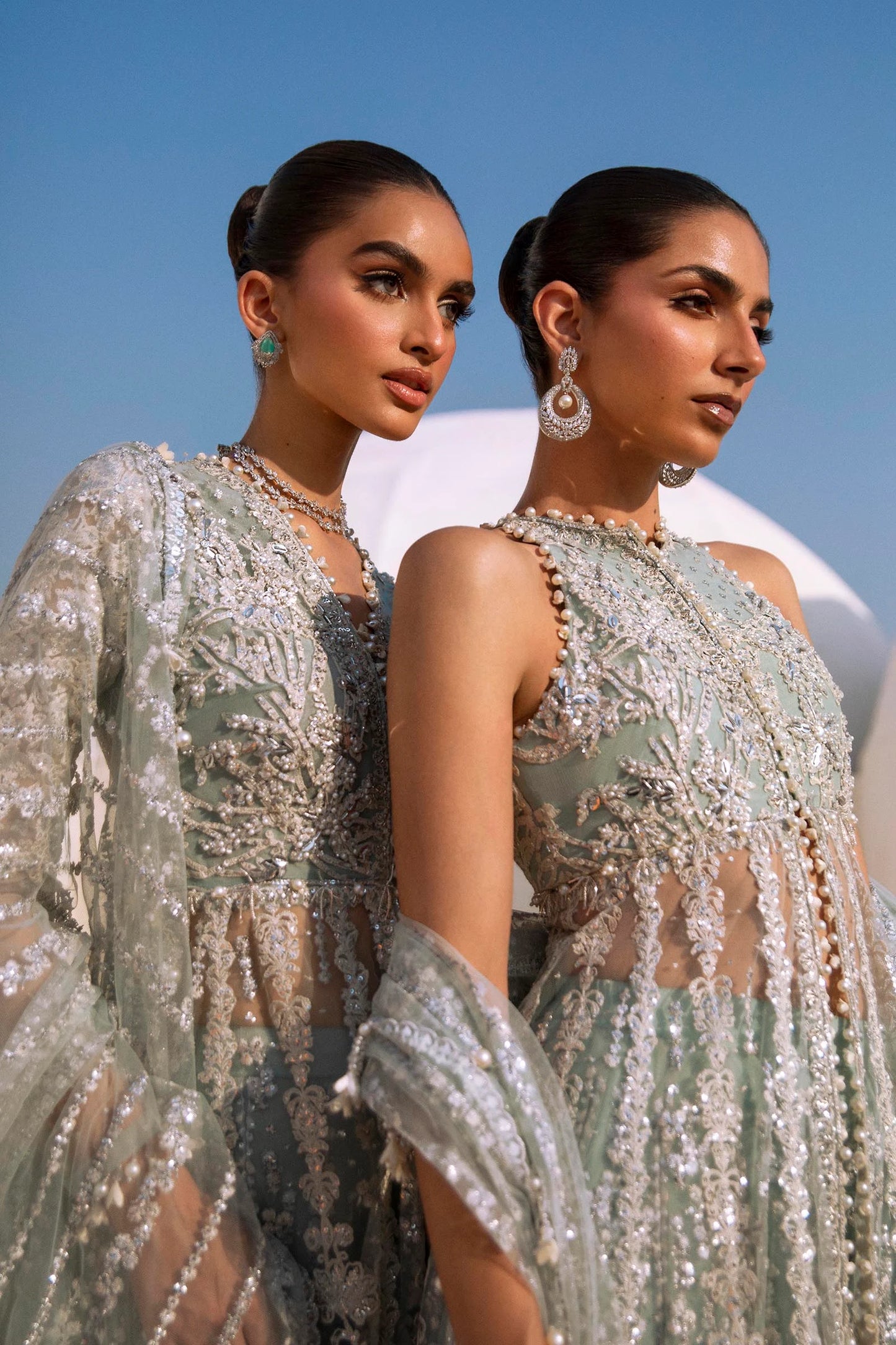 Models in Sana Safinaz N241 - 004 - 3CT luxe embellished gowns, from NURA Collection.