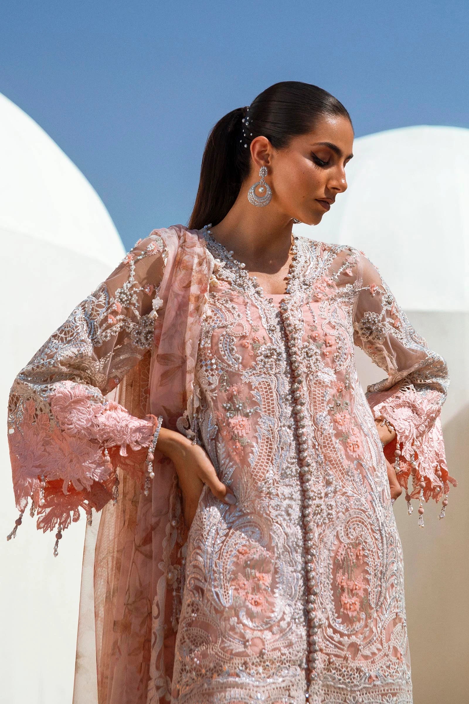 Models in peach Sana Safinaz N241 - 006 - 3CT dresses, UK Pakistani elegance.