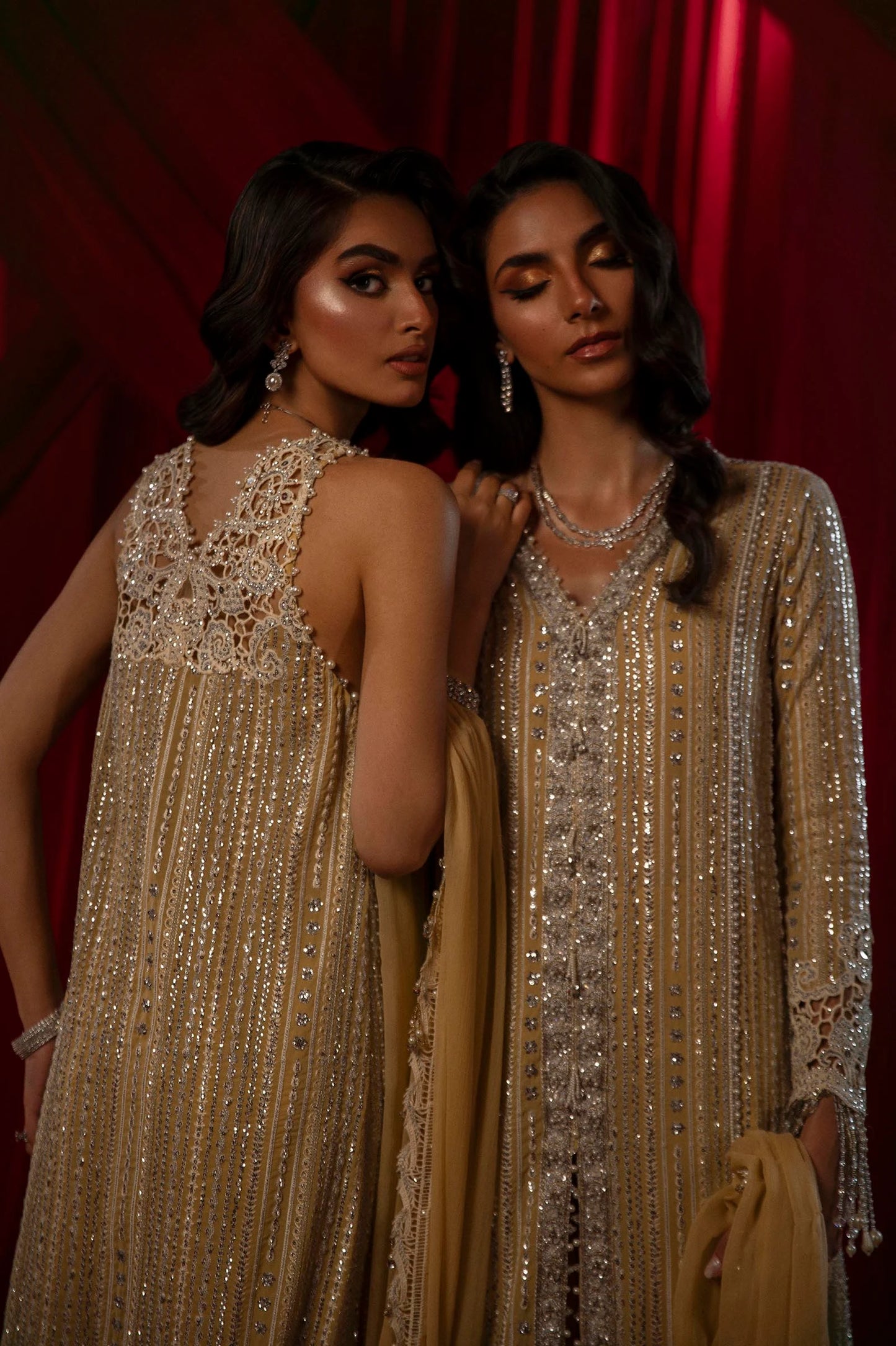 Model in Sana Safinaz gold NURA dress, highlighting luxury Pakistani attire for the UK market.