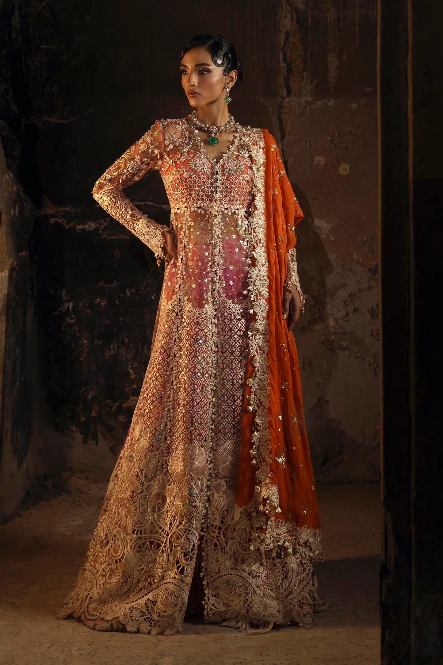 Model wearing deep coral and gold Sana Safinaz N251-002-3CX outfit with intricate embroidery and orange dupatta, Pakistani Luxury pret, Pakistani clothes online in UK.