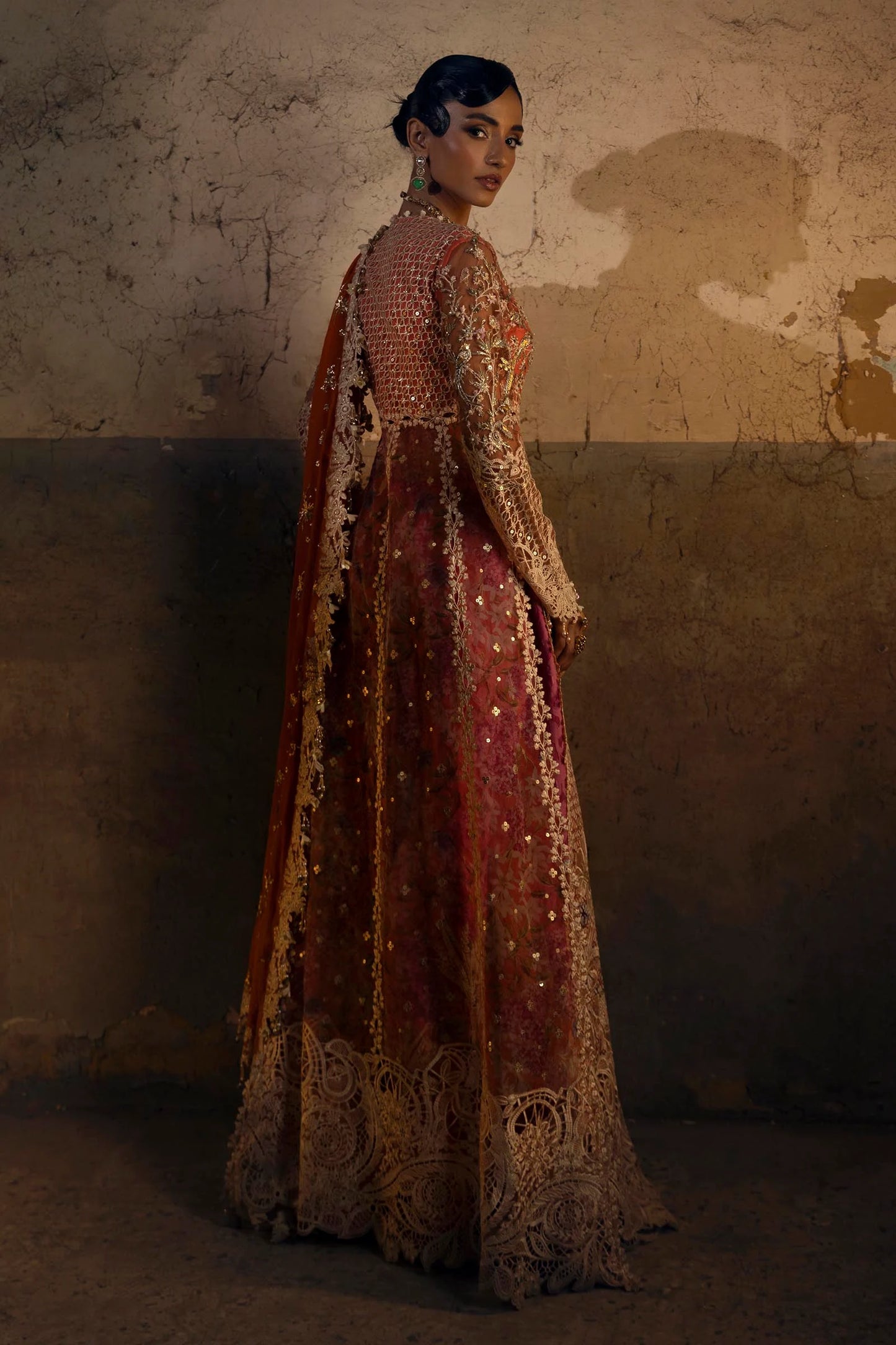 Model wearing deep coral and gold Sana Safinaz N251-002-3CX outfit with intricate embroidery and orange dupatta, Pakistani Luxury pret, Pakistani clothes online in UK.