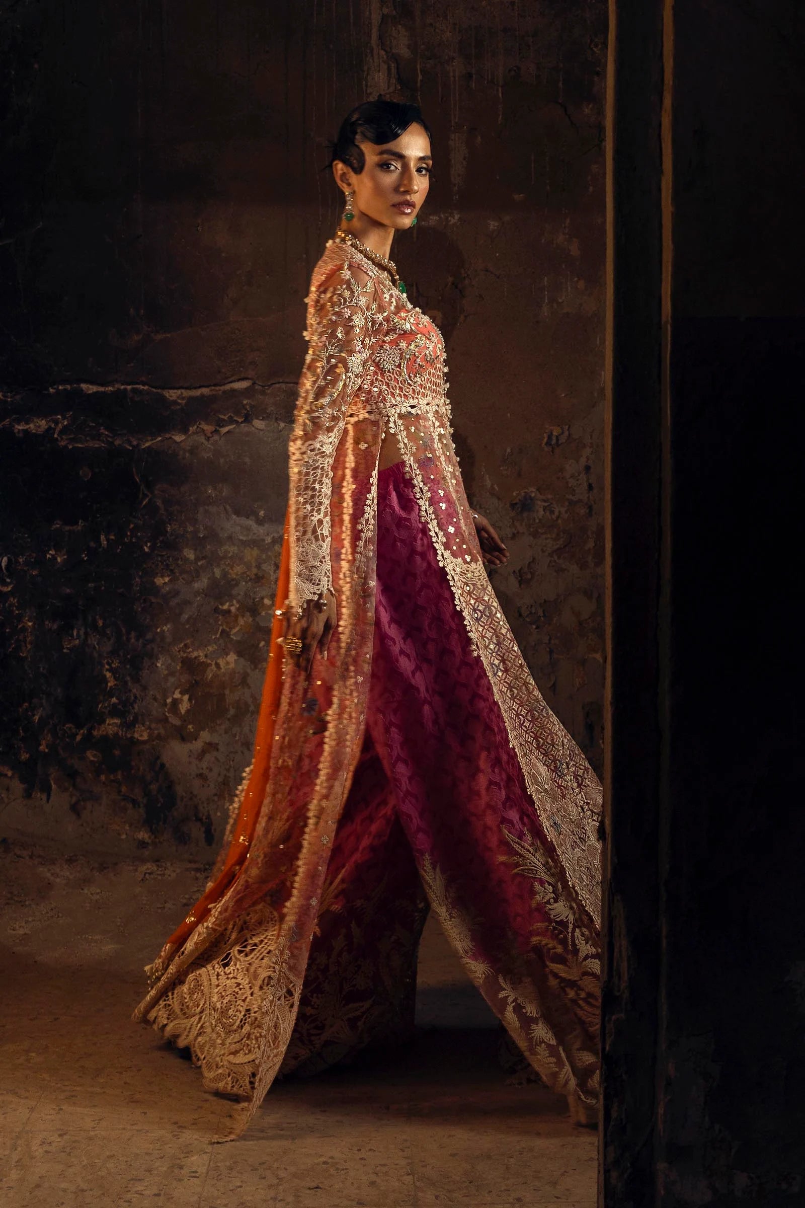 Model wearing deep coral and gold Sana Safinaz N251-002-3CX outfit with intricate embroidery and orange dupatta, Pakistani Luxury pret, Pakistani clothes online in UK.