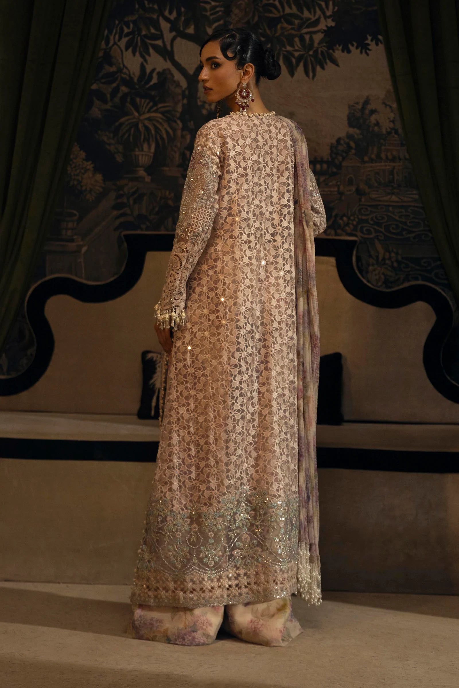 Model wearing pastel beige Sana Safinaz N251-004-3DJ outfit with mirror work and floral printed lehenga, Pakistani Luxury pret, Pakistani clothes online in UK.
