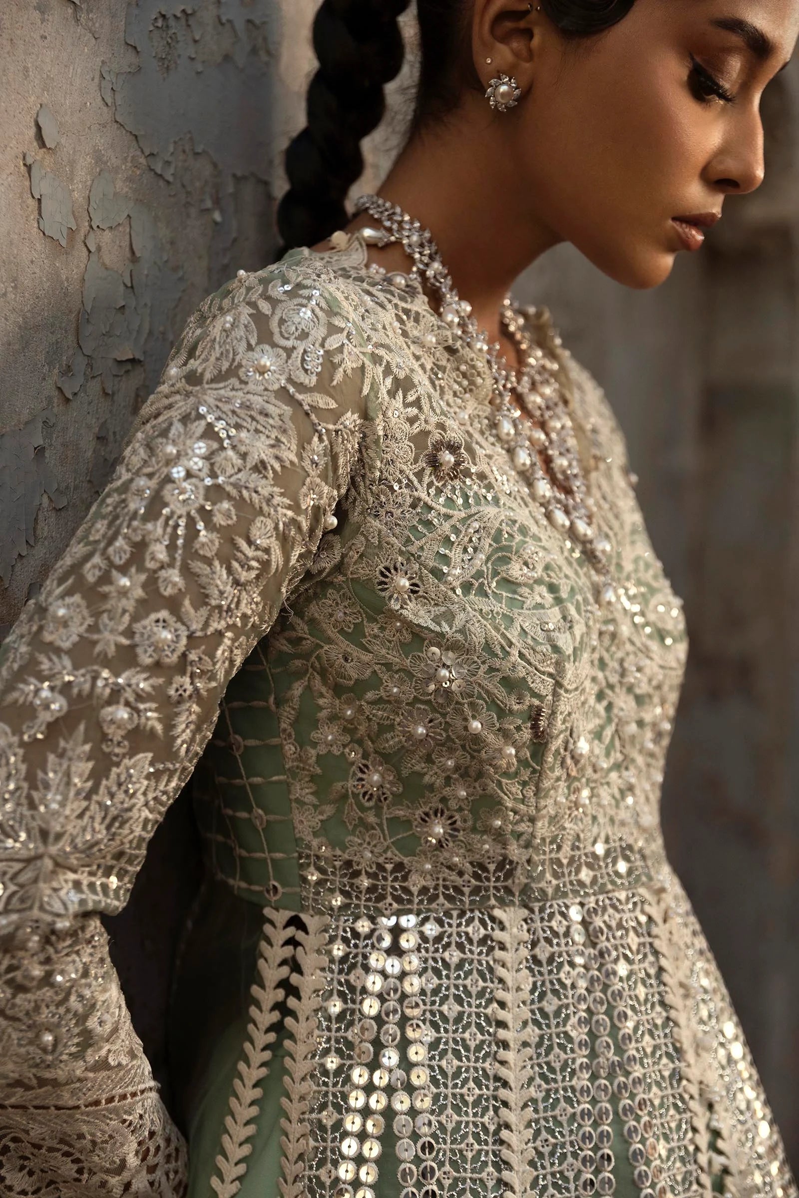 Model wearing mint green Sana Safinaz N251-005-3CX heavily embroidered gown with mirror work, Pakistani Luxury pret, Pakistani clothes online in UK.